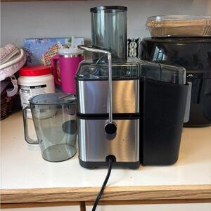 Stainless Steel Juicer with Black Accents